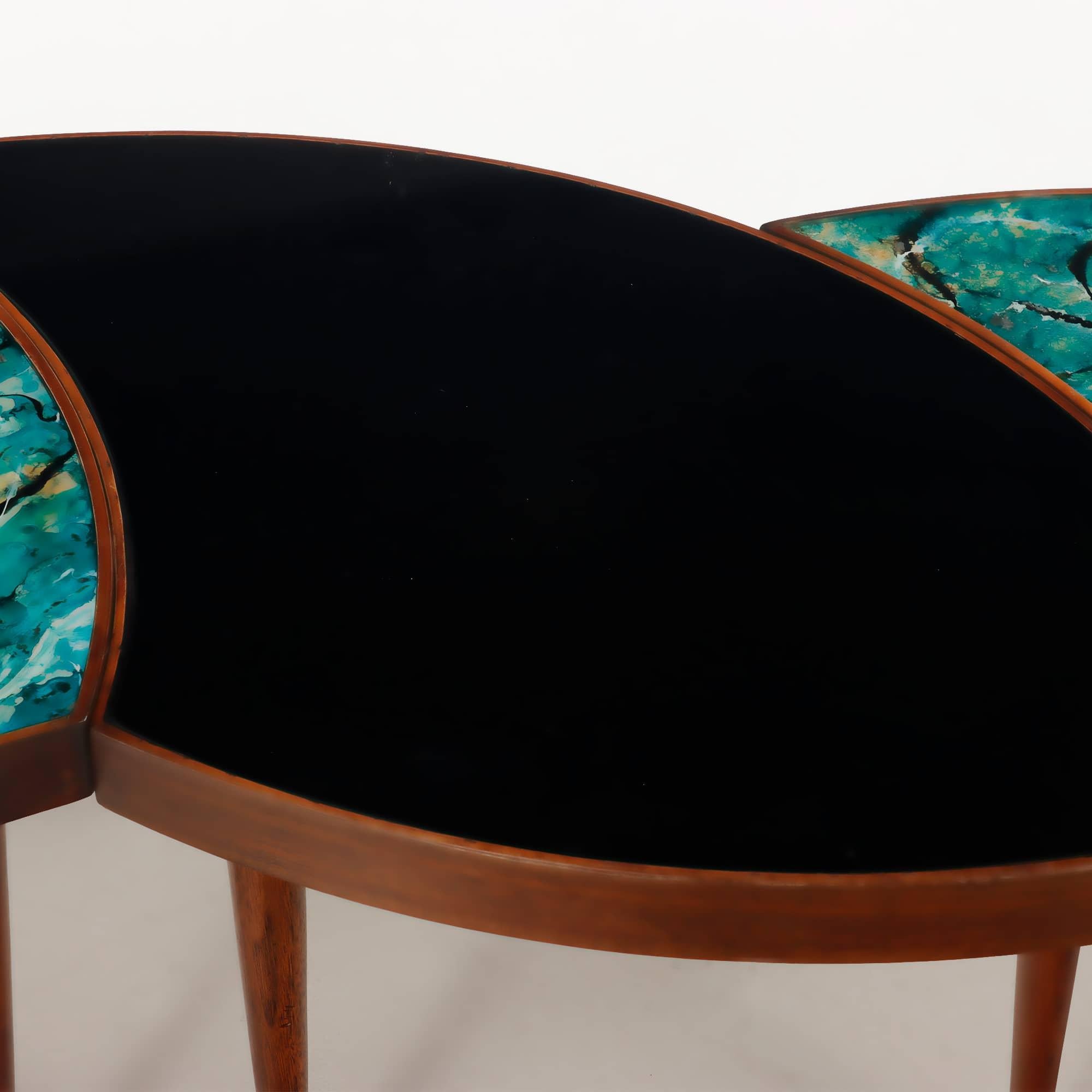 20th Century A three-part biomorphic marbleized glass and walnut circular coffee table. For Sale