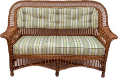 A Three Piece Matching Suite of Antique Bar Harbor Style Wicker Furniture