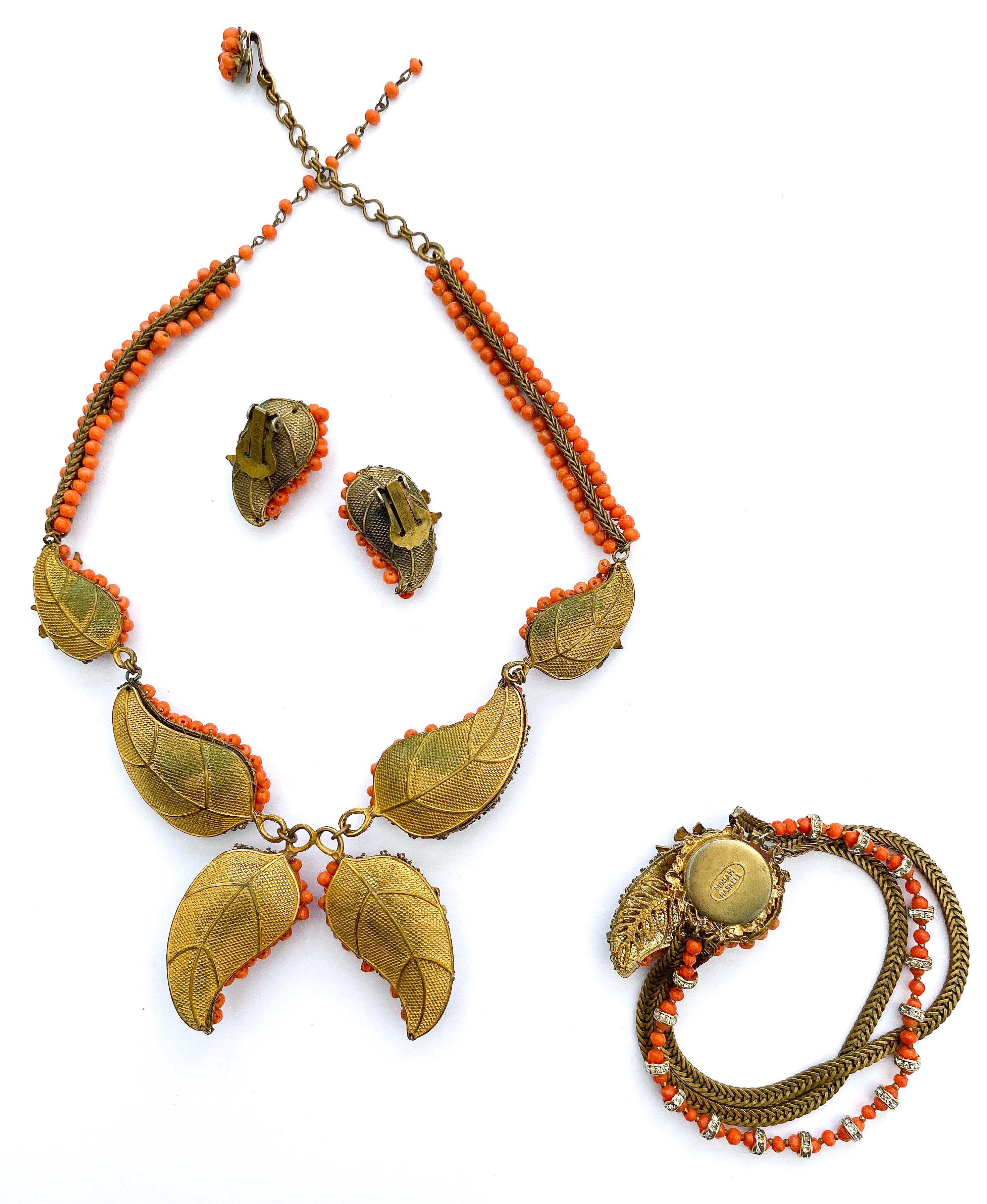 Women's A three piece parure in coral glass beads and gilt metal, Miriam Haskell, 1950s For Sale