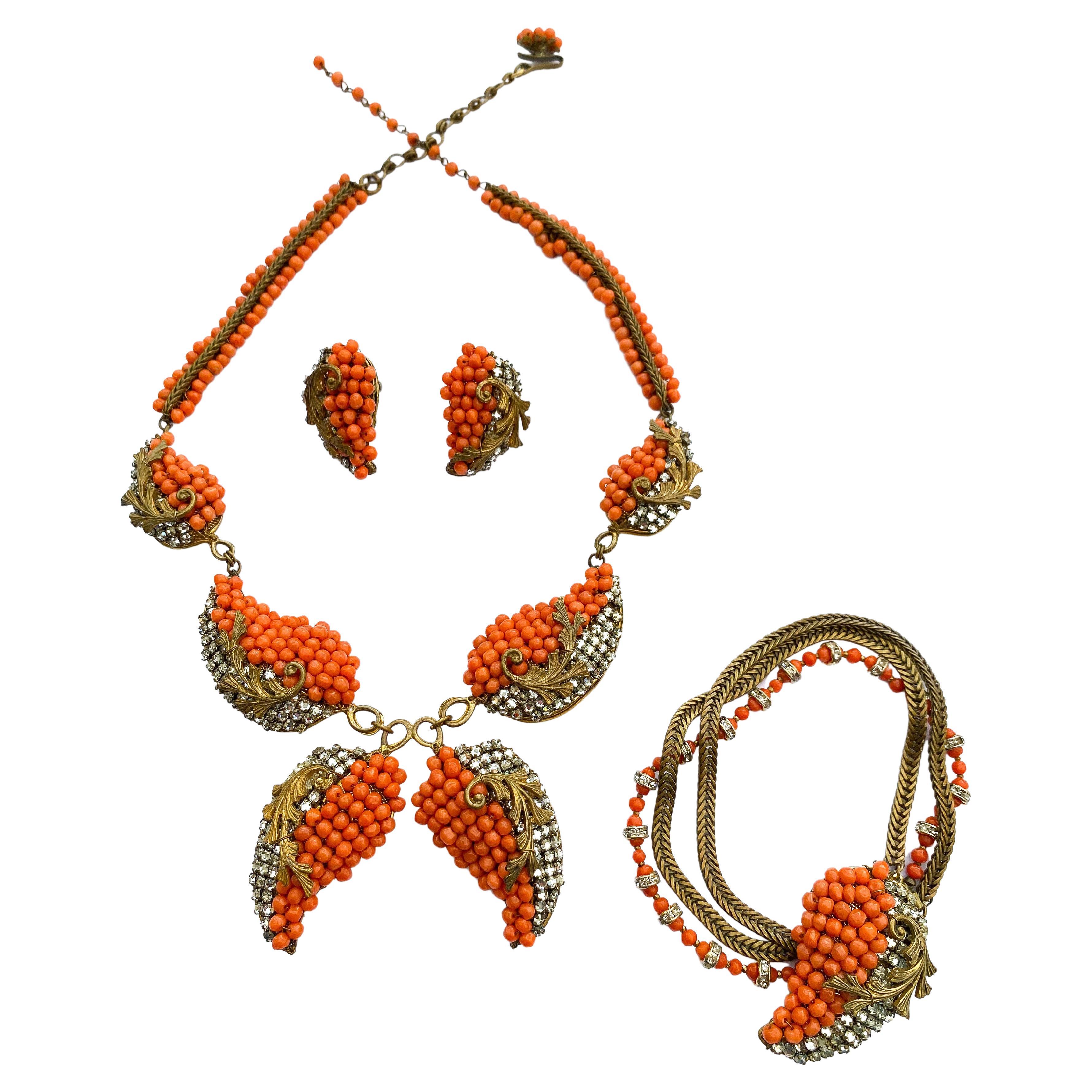 A three piece parure in coral glass beads and gilt metal, Miriam Haskell, 1950s