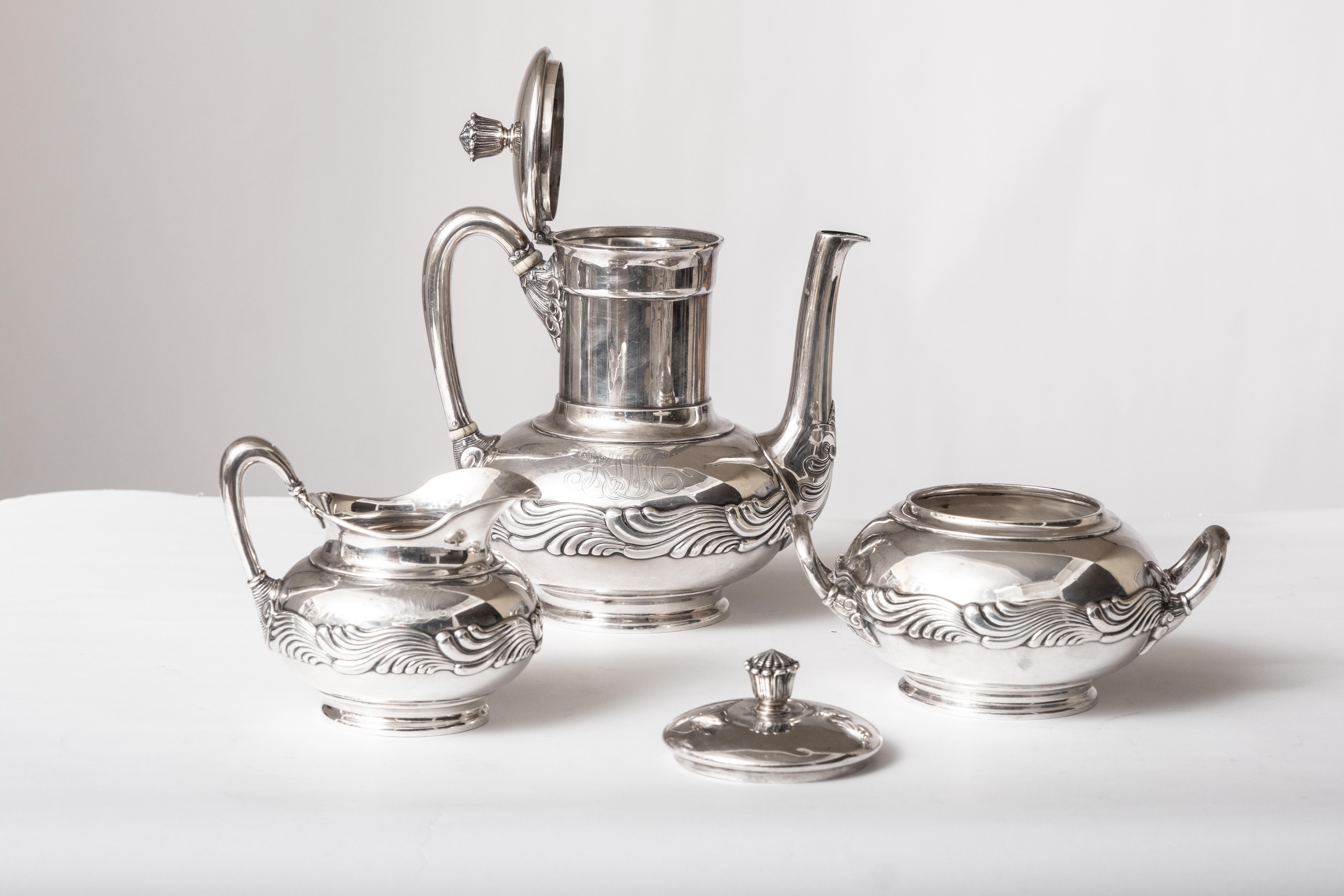 A Three Piece Tiffany & Co. Signed Sterling Silver Art Nouveau Coffee Service  1