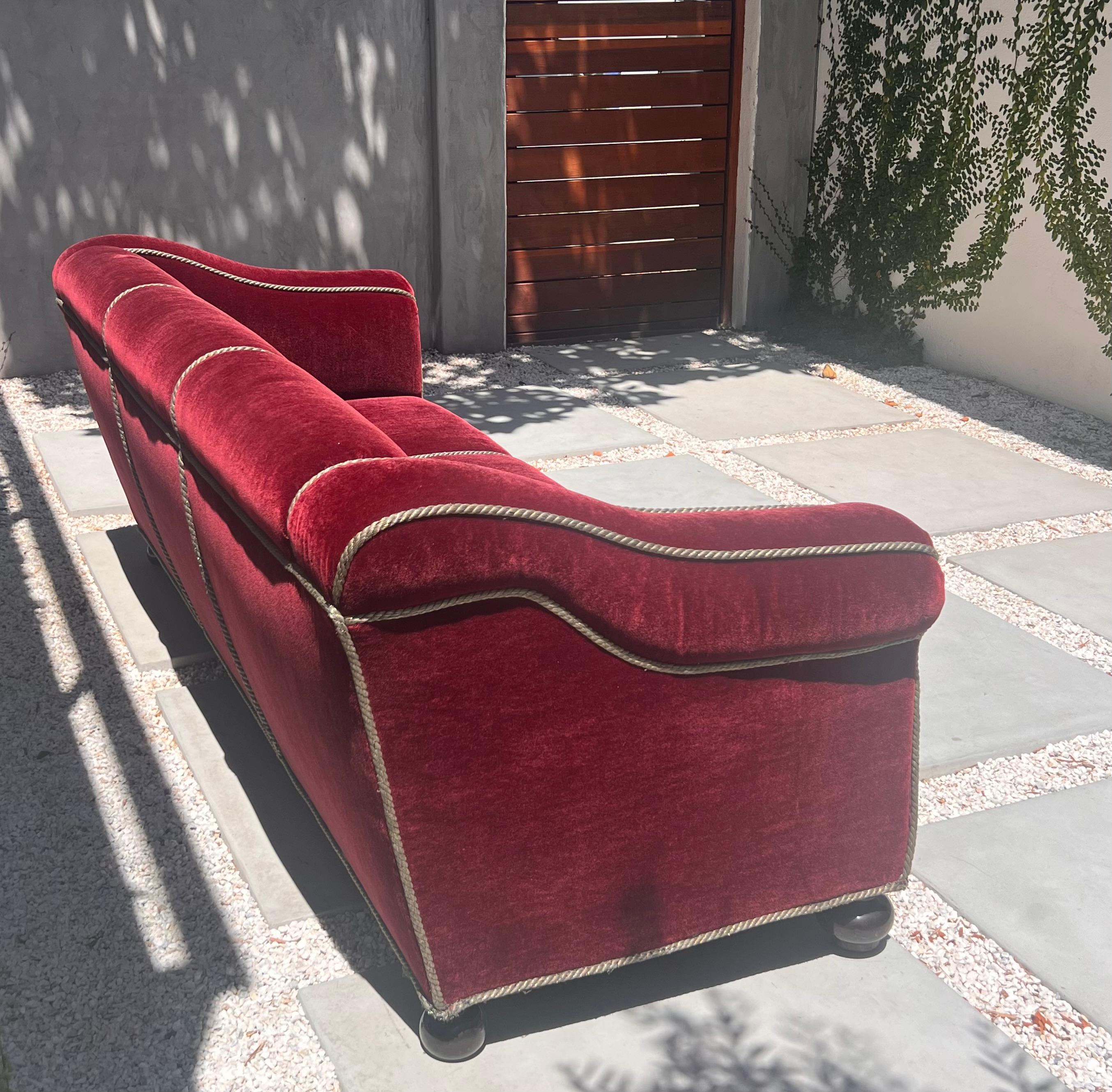 A three seater sofa by Minton-Spidell in burgundy mohair, 20th century 10