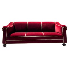 A three seater sofa by Minton-Spidell in burgundy mohair, 20th century