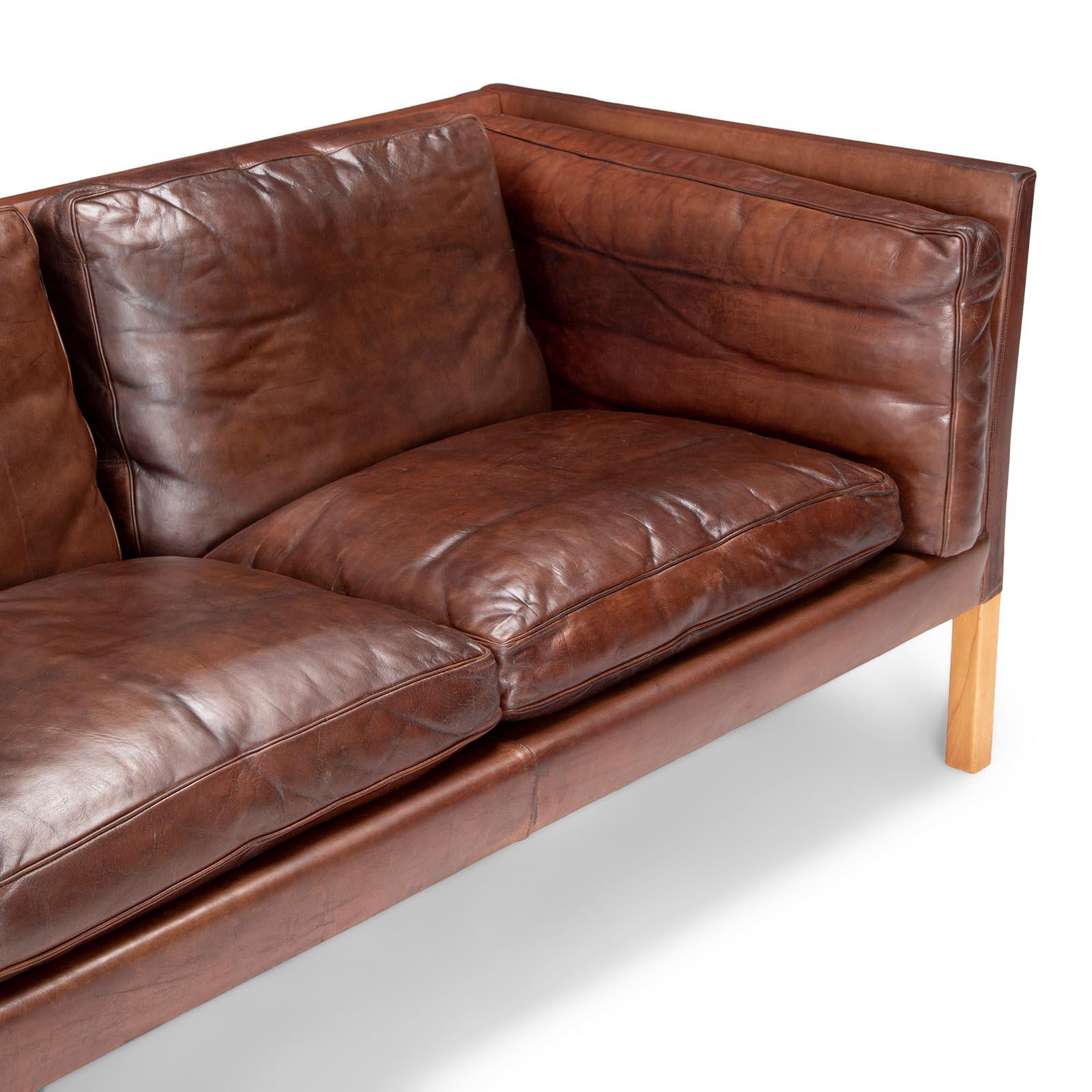 leather three seat sofas