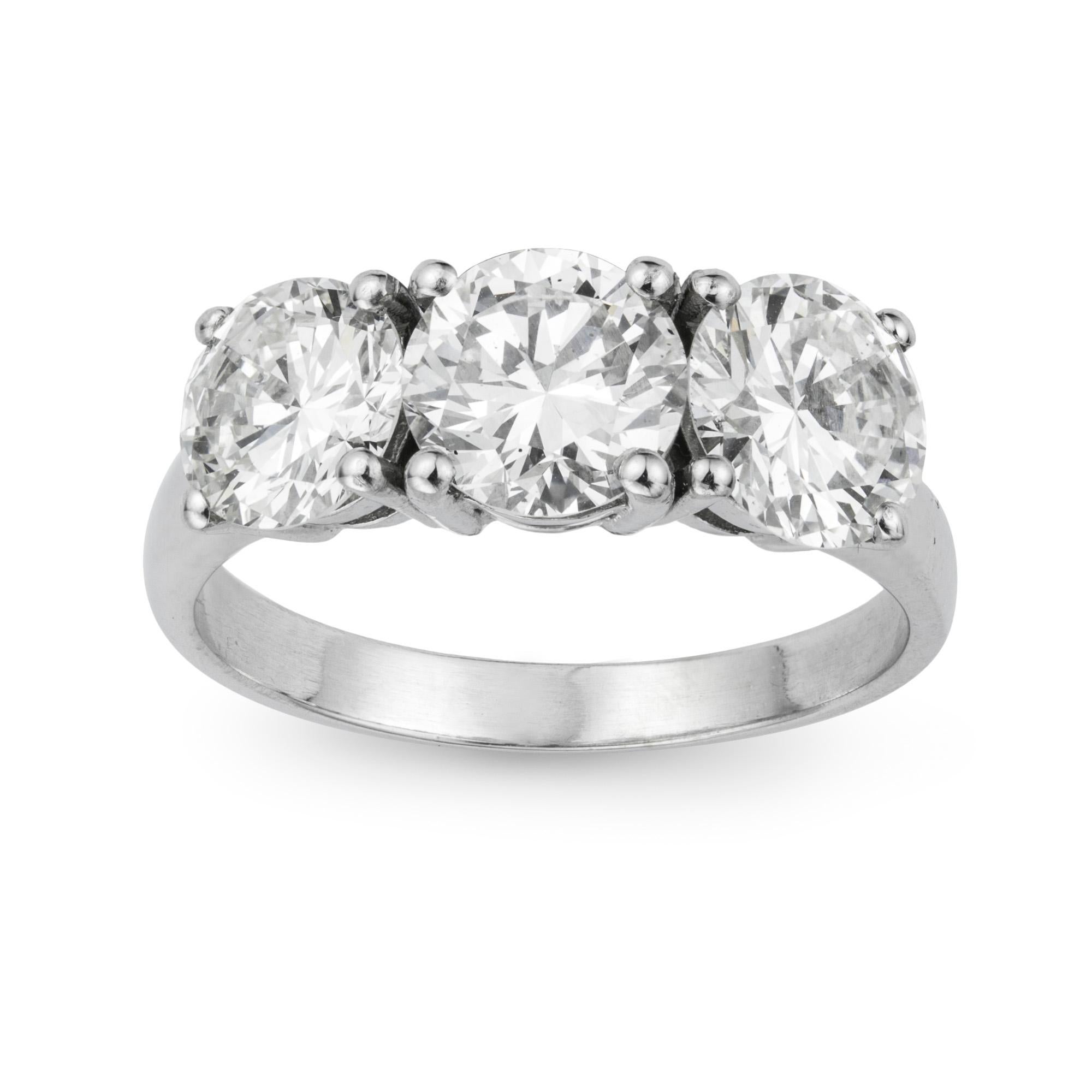 Round Cut A Three Stone Diamond Ring For Sale