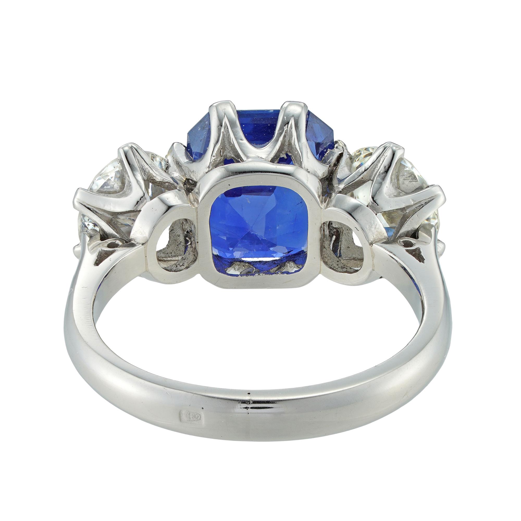 Modern Three-Stone Sapphire and Diamond Ring