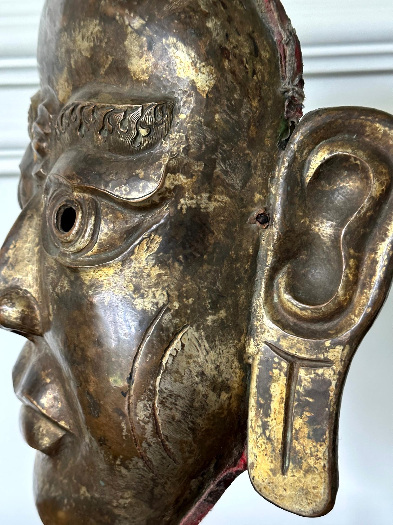 Tibetan Gilt Copper Alloy Mask on Display Stand For Sale 10