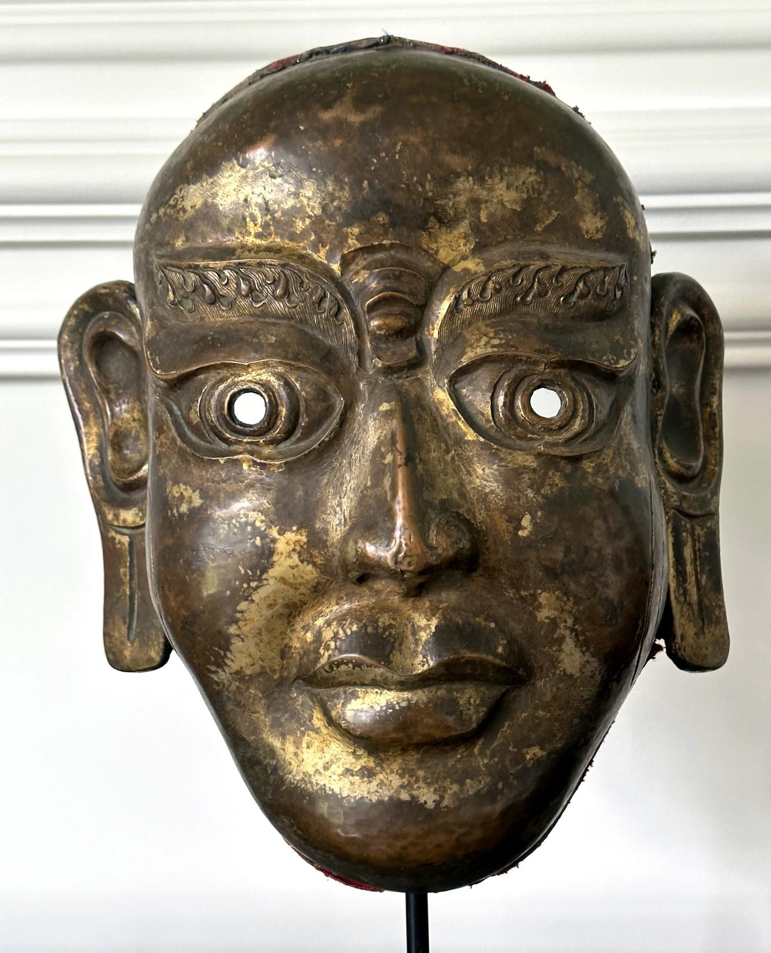 Tibetan Gilt Copper Alloy Mask on Display Stand For Sale 1