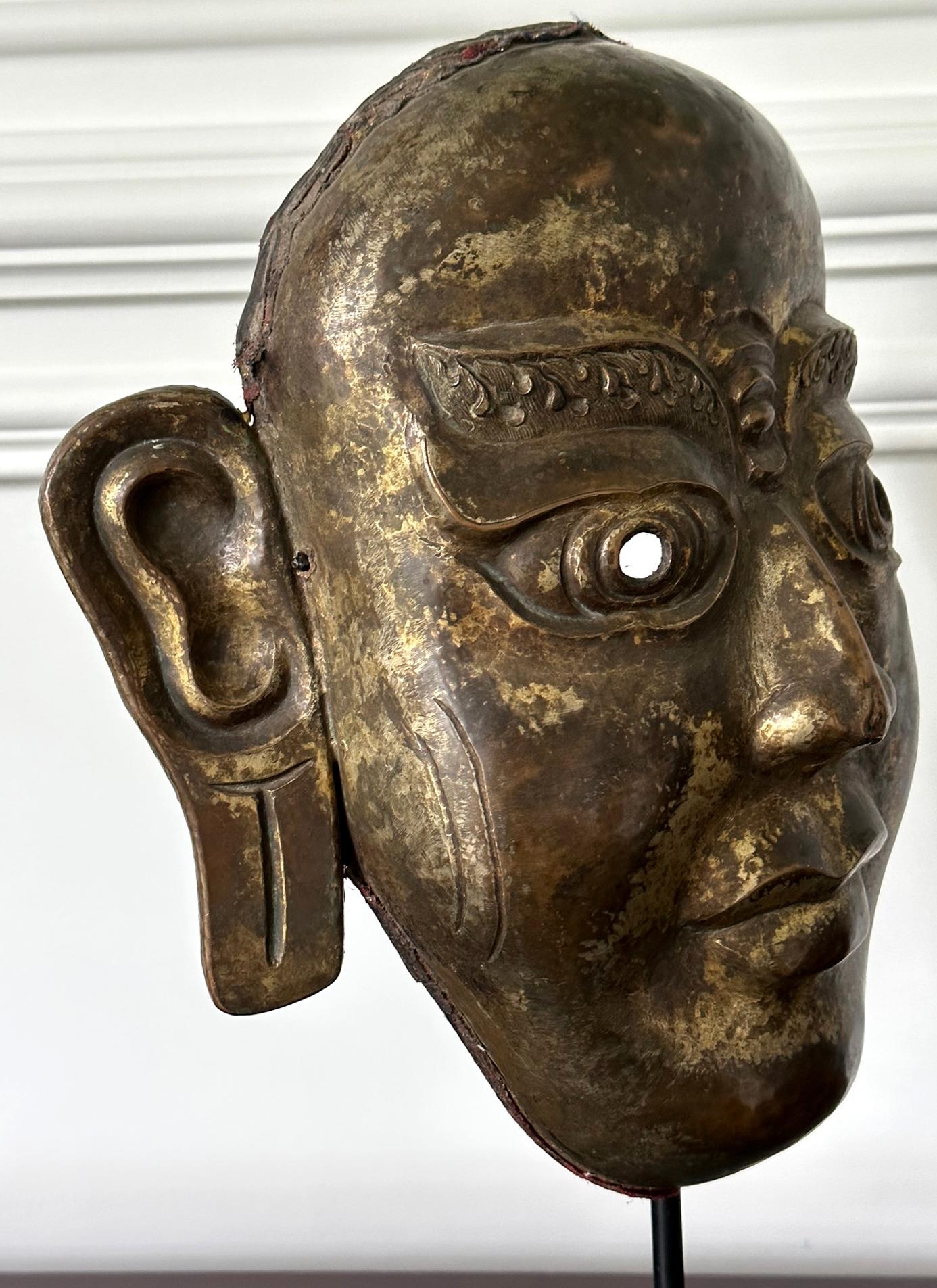 Tibetan Gilt Copper Alloy Mask on Display Stand For Sale 3