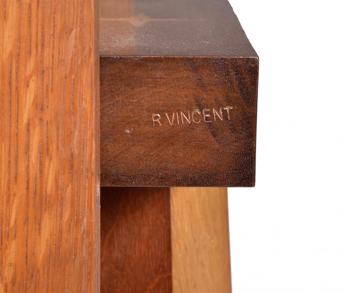 An interesting parquetry Arts & Crafts style tilt-top table stamped R. Vincent.