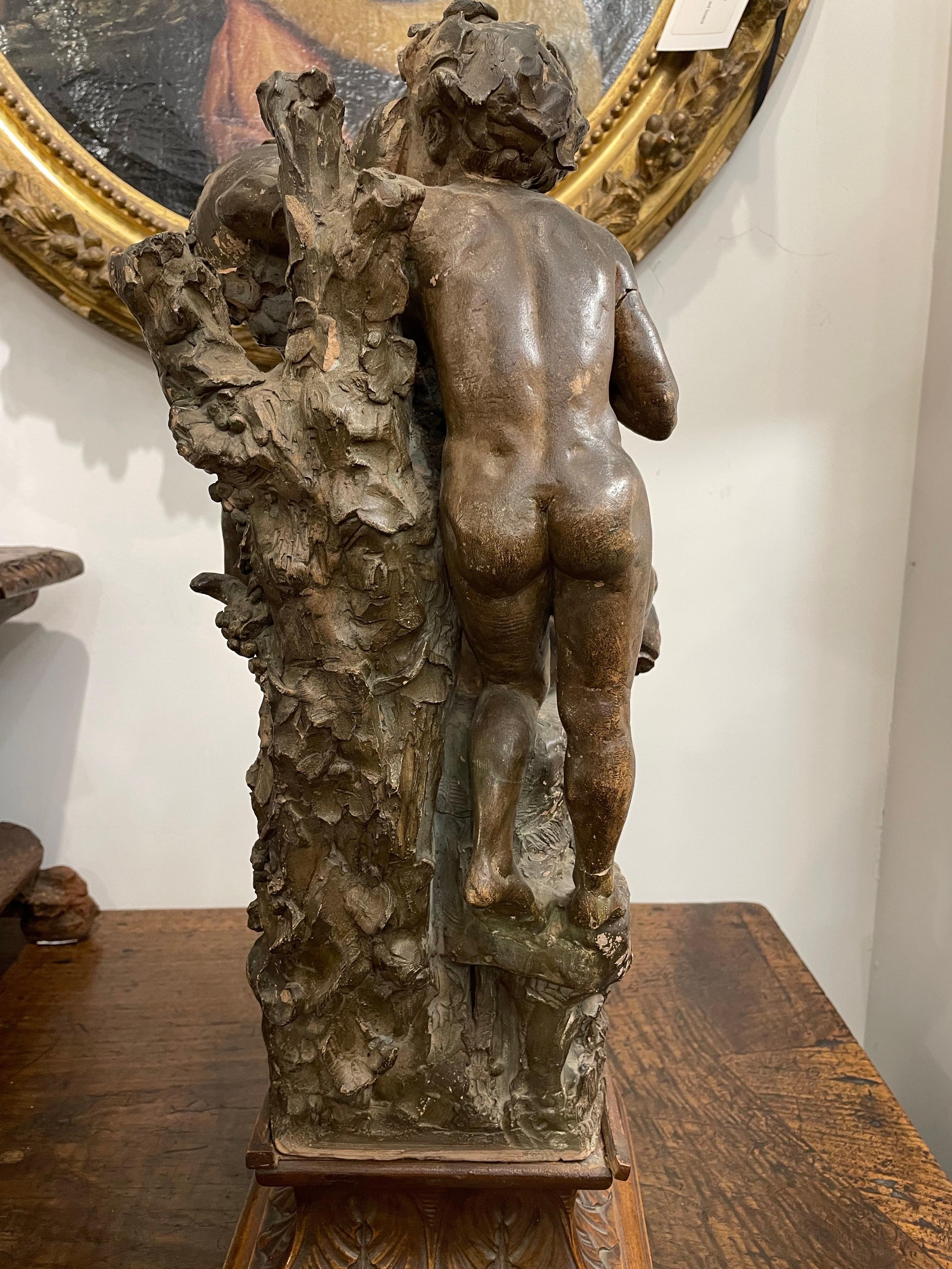 Legno Gruppo di legno con Sileno addormentato e giovane, probabilmente Dioniso, XVII secolo in vendita