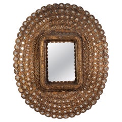 A Timber Peacock Mirror