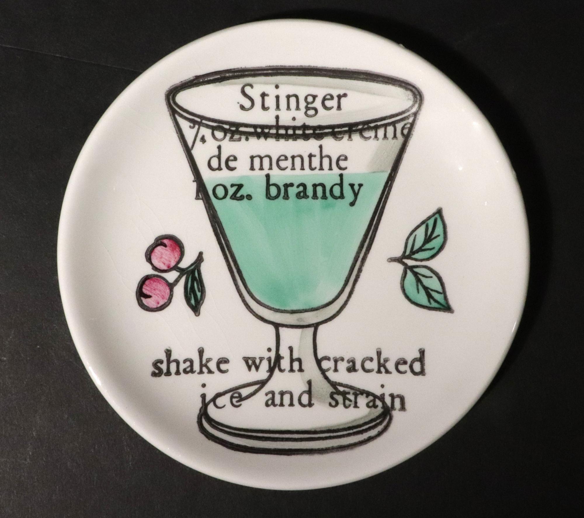 A Toast to Wit: Fornasetti's Cocktail Coasters,
1950s-60s.

This complete set of eight large coasters is a quintessential example of Piero Fornasetti's genius for elevating the everyday with surrealism and sophisticated humor. Produced in the