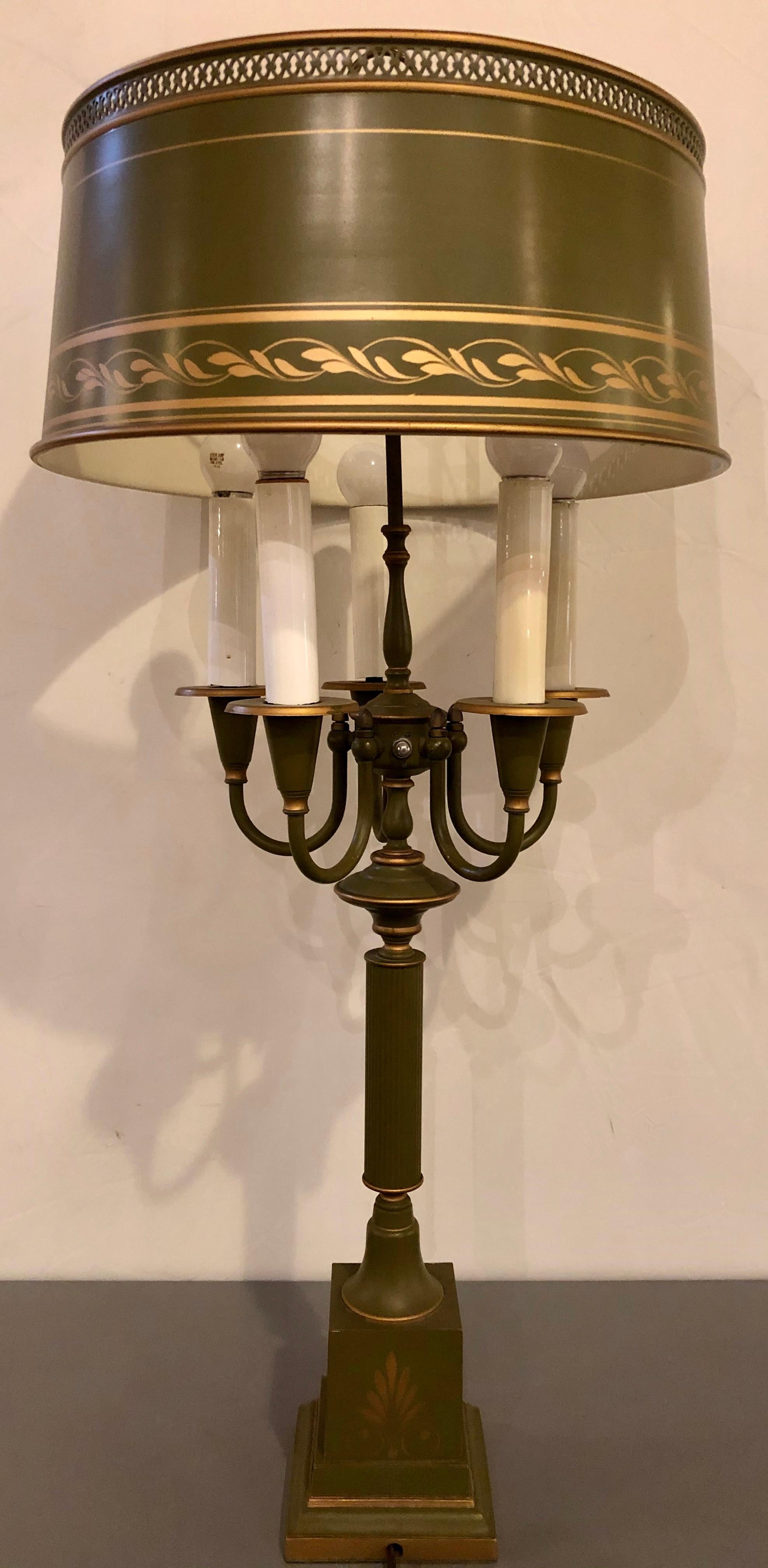A tole sage green and parcel gilt decorated candelabra lamp. Matching tole shade
SX.