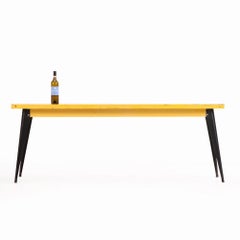 A Tolix yellow iron table, C. 1940.