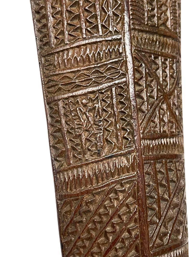 A Tonga Pakipaki war club, Polynesia, 18th century

An exceptional ironwood war club originating from Tonga, Polynesia. 18th century and hand carved with complex geometric patterns running the length of the shaft. 
4 human and 1 botanical glyphs