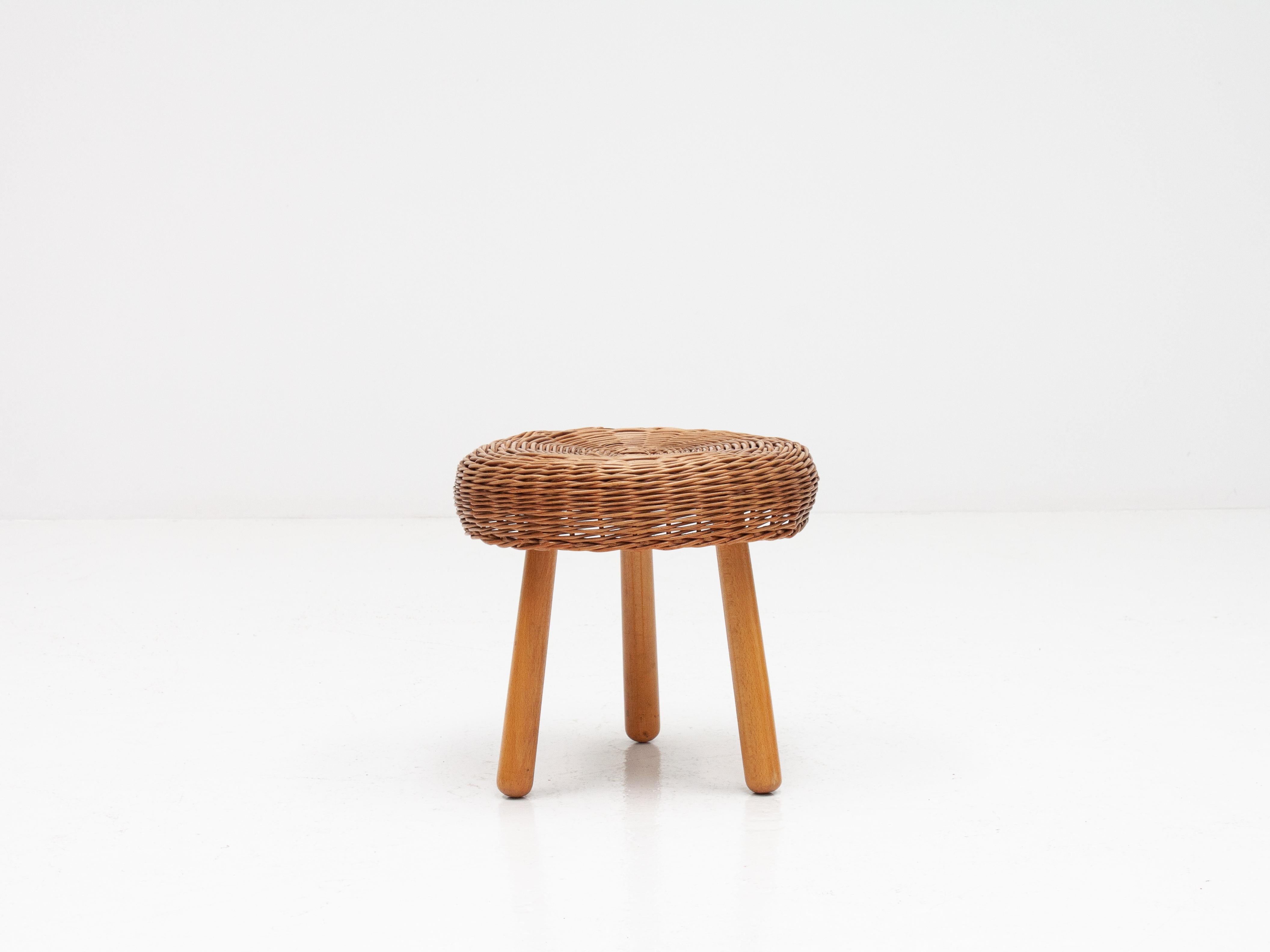 A Tony Paul style vintage wicker stool, 1960s.

The stool is constructed of a woven wicker seat sitting on 3 tapered beech legs.

In good condition, some very minor imperfections to cane.

 

 