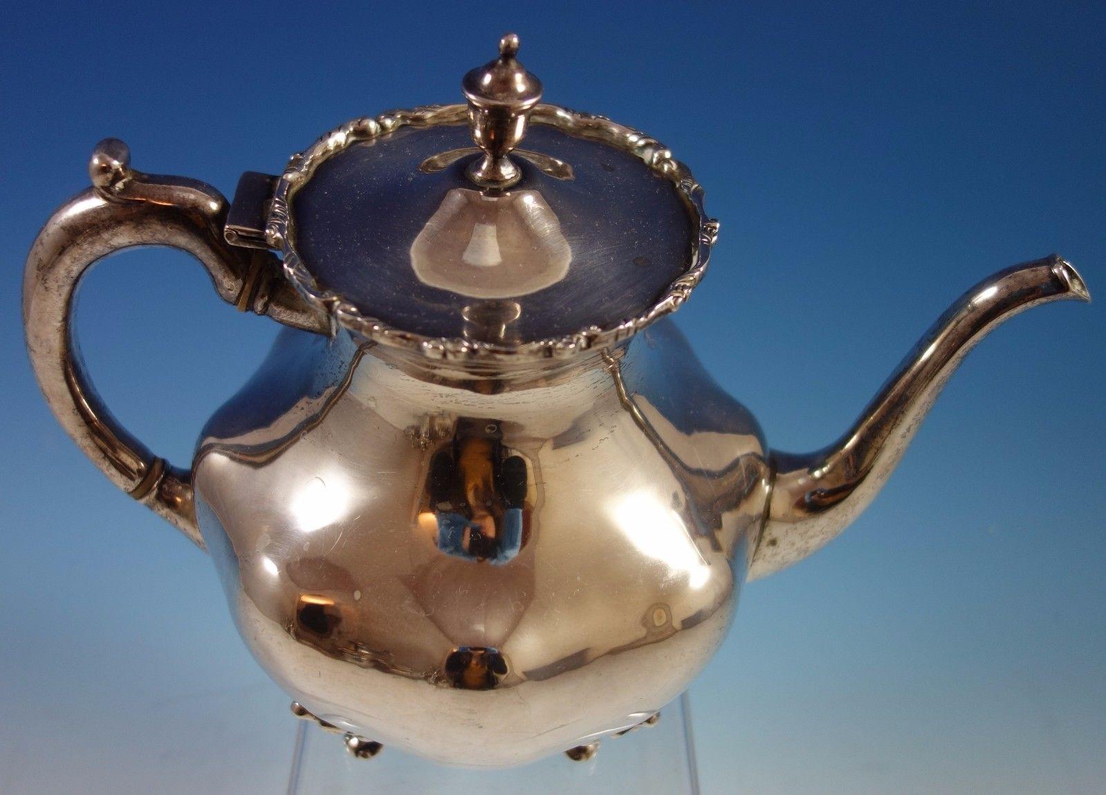 A. Torres Vega
Mexican sterling silver 5-piece tea set with tray by A. Torres Vega in Mexico City, circa 1950s. This set includes: 1 - Sterling tray: Weighing 40.58 troy ounces and measuring 21