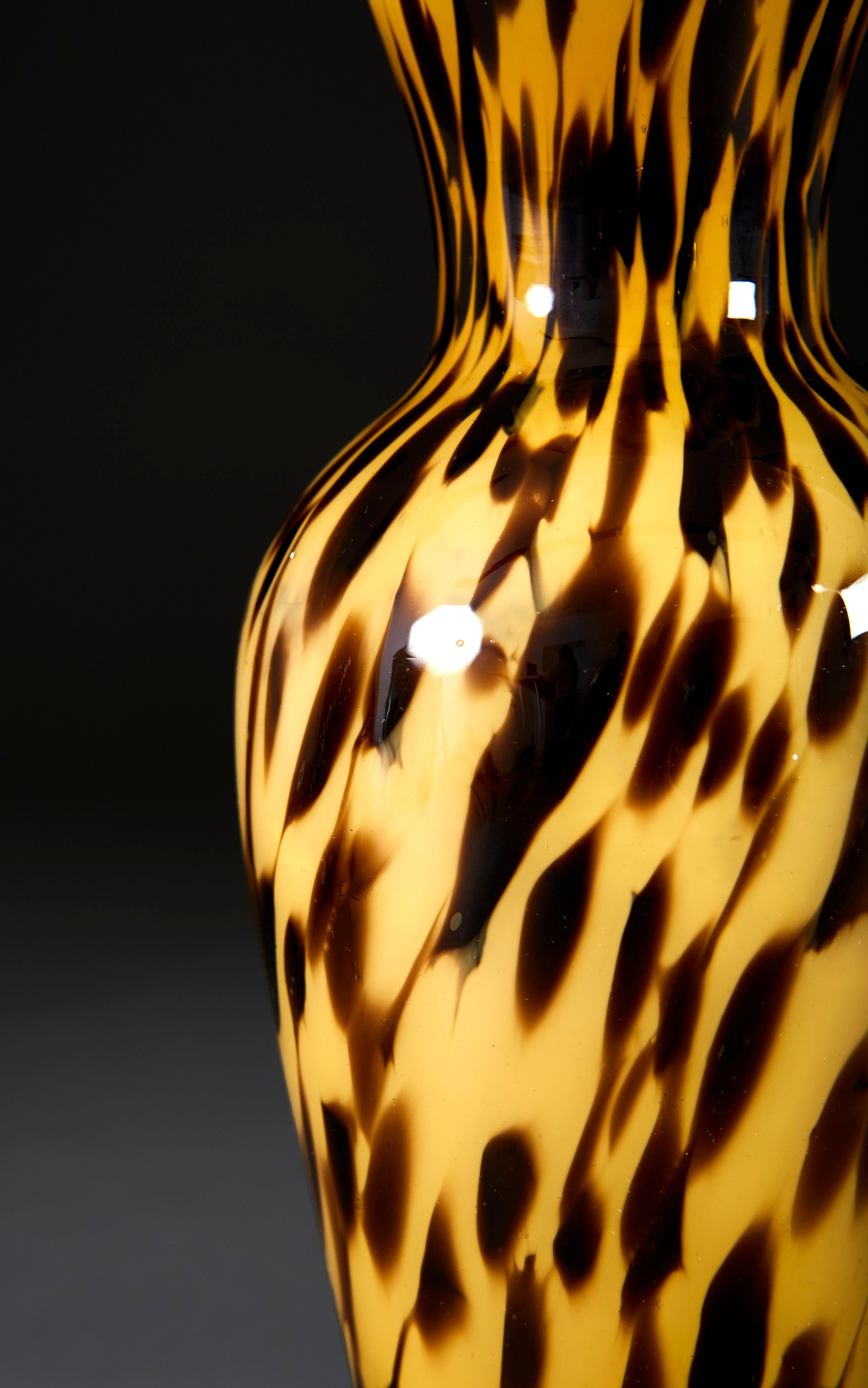 A mid-20th century Murano glass vase with tortoiseshell decoration throughout, now converted as a lamp.

Please note: lampshade not included.

Currently wired for the UK.