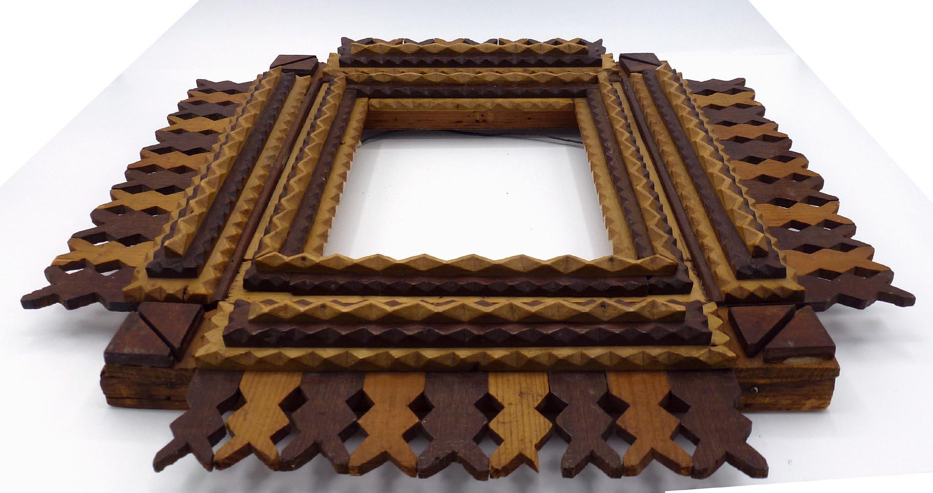 Hand-Carved Tramp Art Frame with a Design of Light and Dark Woods, Pieced Openwork Border