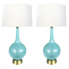 A Translucent Pair of Murano 1960's Pale-Blue Bottle-Form Lamps