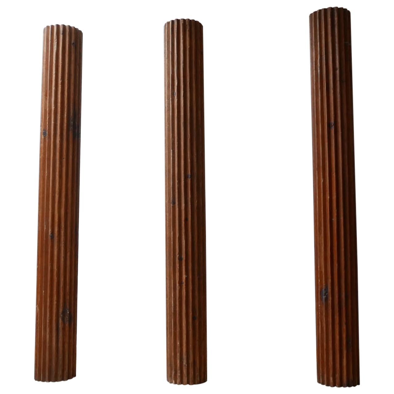 A Trio of Antique French Wooden Columns