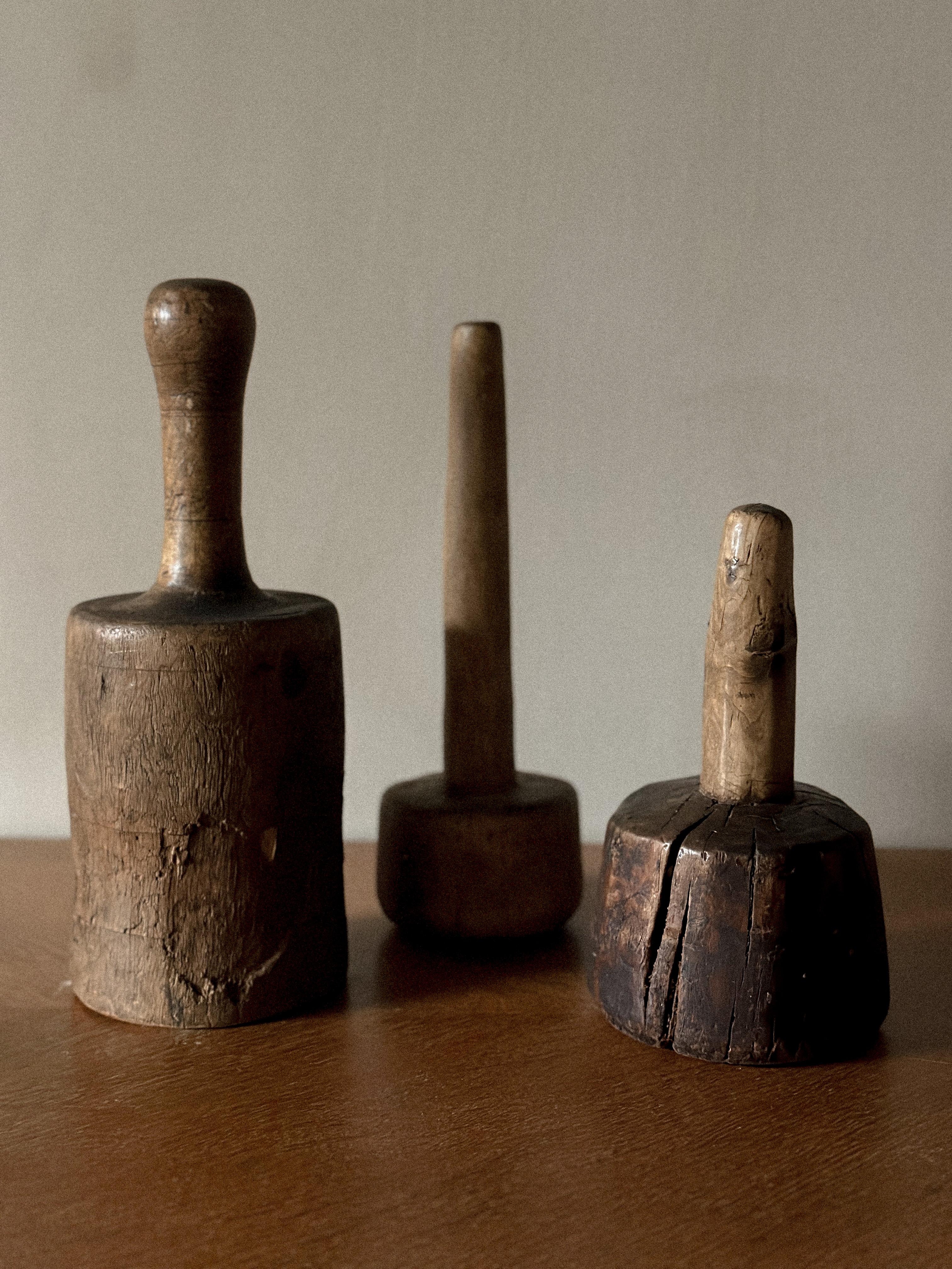 Stone A Trio of Antique Wooden Pestles from the 19th Century For Sale