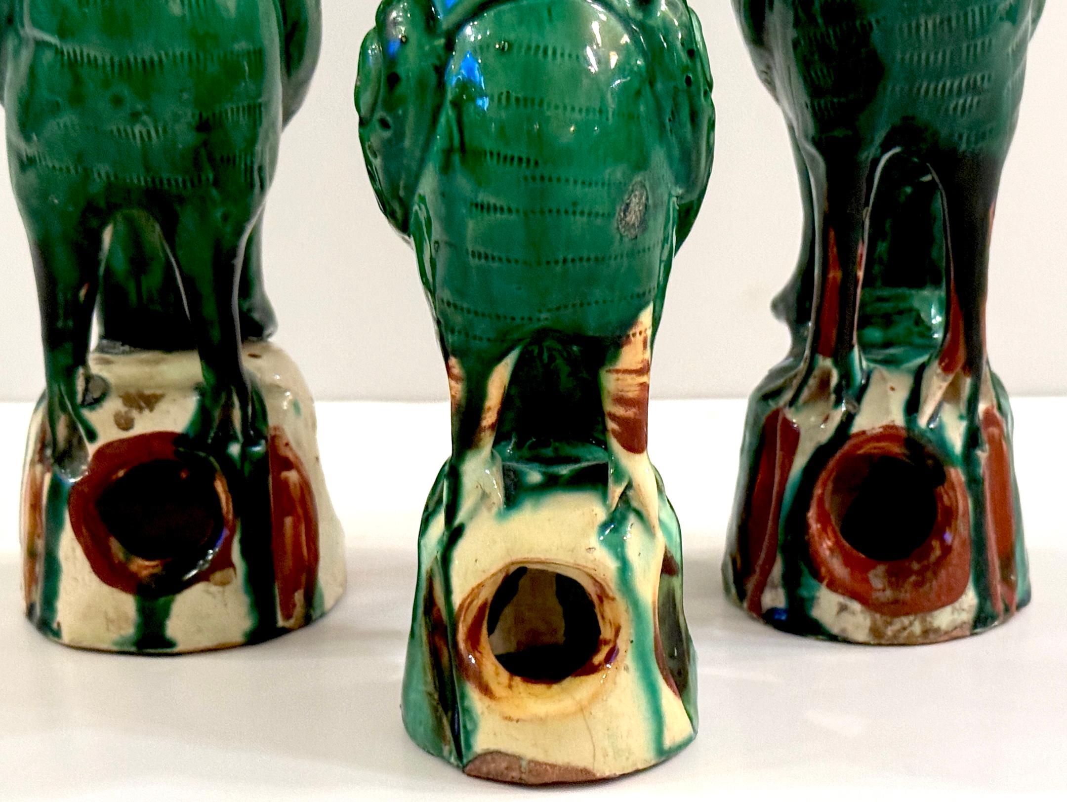 A Trio of Chinese Export Porcelain Green Sancai Glazed Parrots

China, Late 19th Century 

This exquisite trio of Chinese export porcelain green Sancai-glazed parrots, crafted in the late 19th century, presents a captivating collection of finely