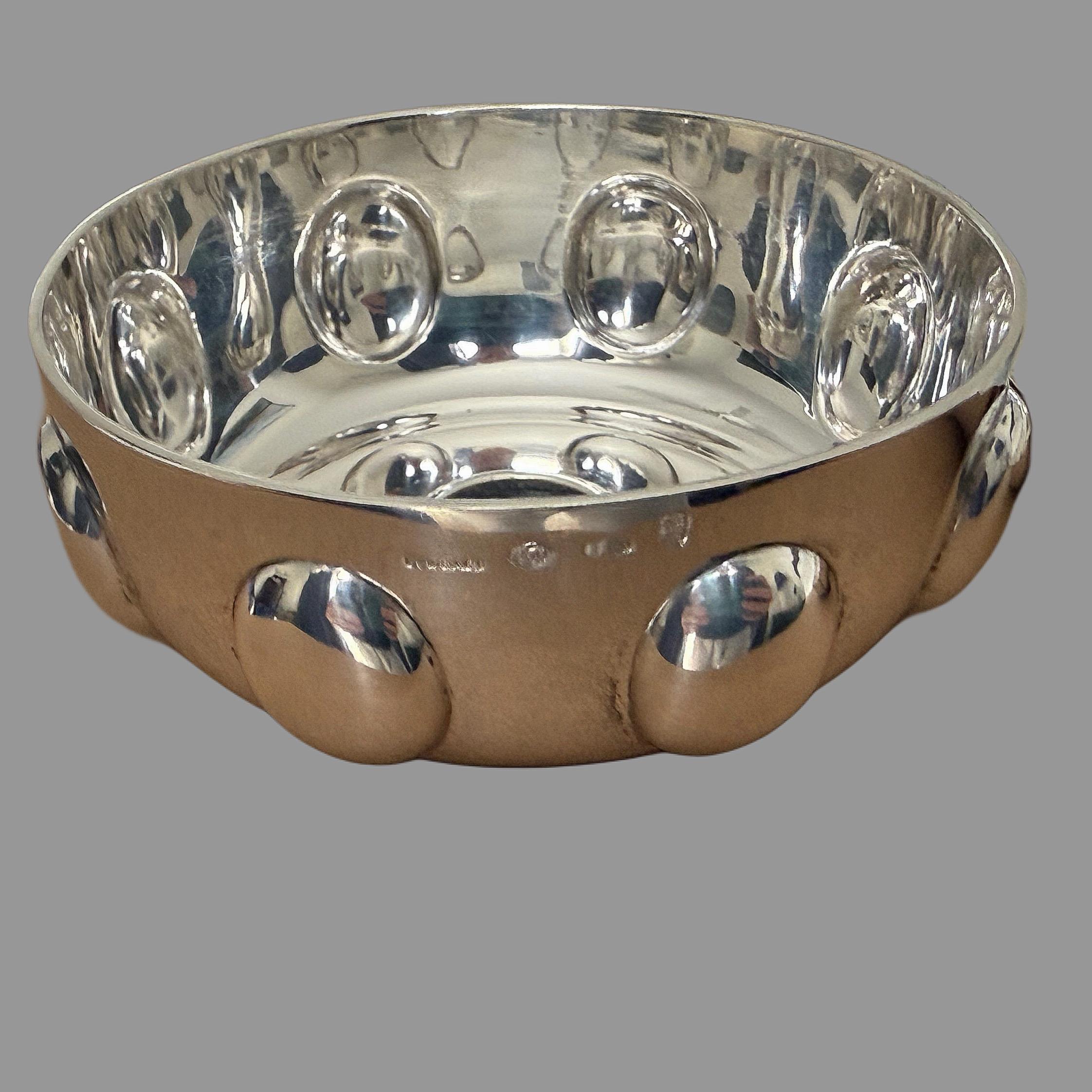 A trio of rare sterling silver pieces with inset ancient Roman coins, Bulgari and after Bulgari, 20th century: 

1. Bulgari -Larger tray in sterling silver with larger authentic ancient bronze Roman coin, measures 4.5 inches across , weighs 118