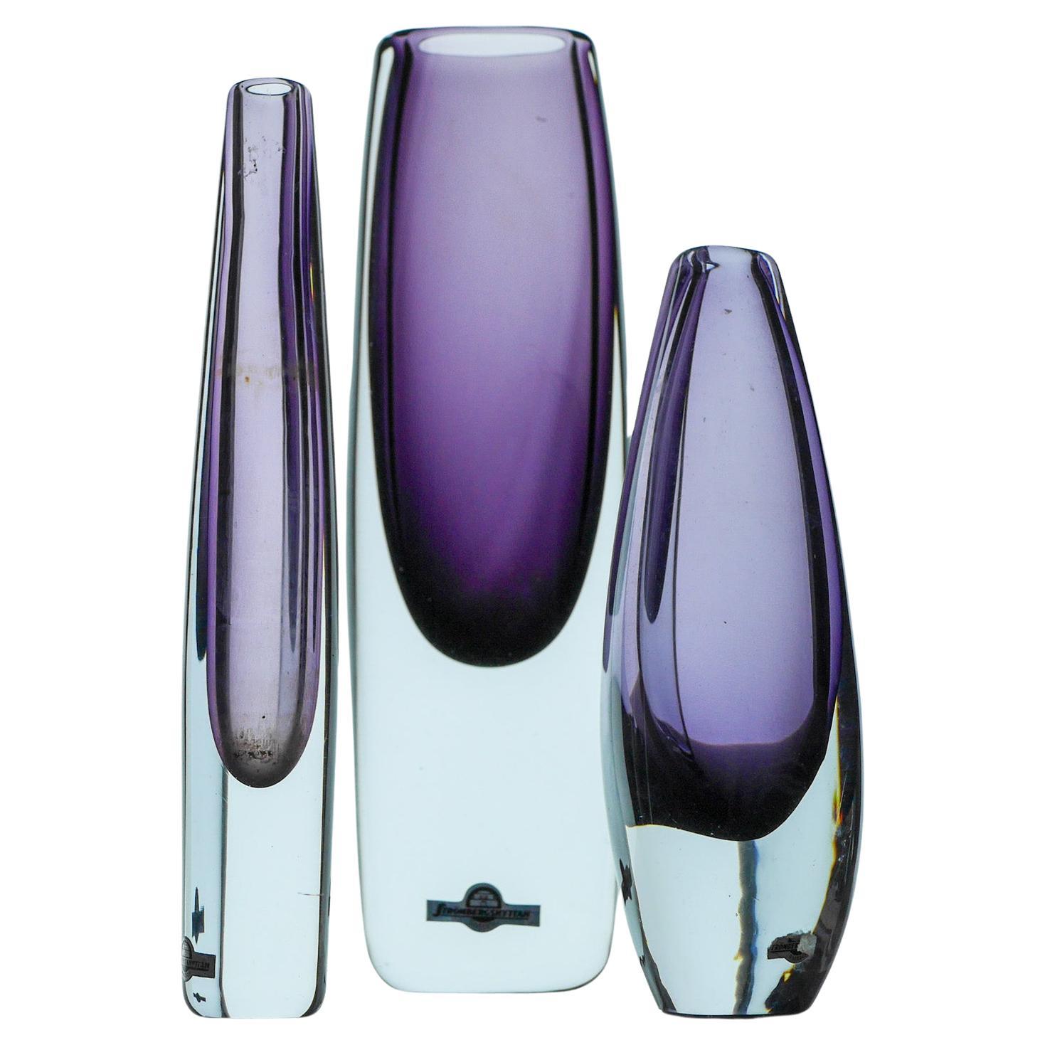 A trio Sommerso glass vases in purple by Gunnar Nylund Strömbergshyttan Sweden