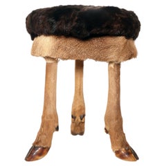 A tripod stool made from legs and fur of deer, Austria 1880.