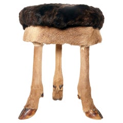 A tripod stool made from legs and fur of deer, Austria 1880.