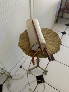 A tripod table lamp wood and fiberglass circa 1950-1960