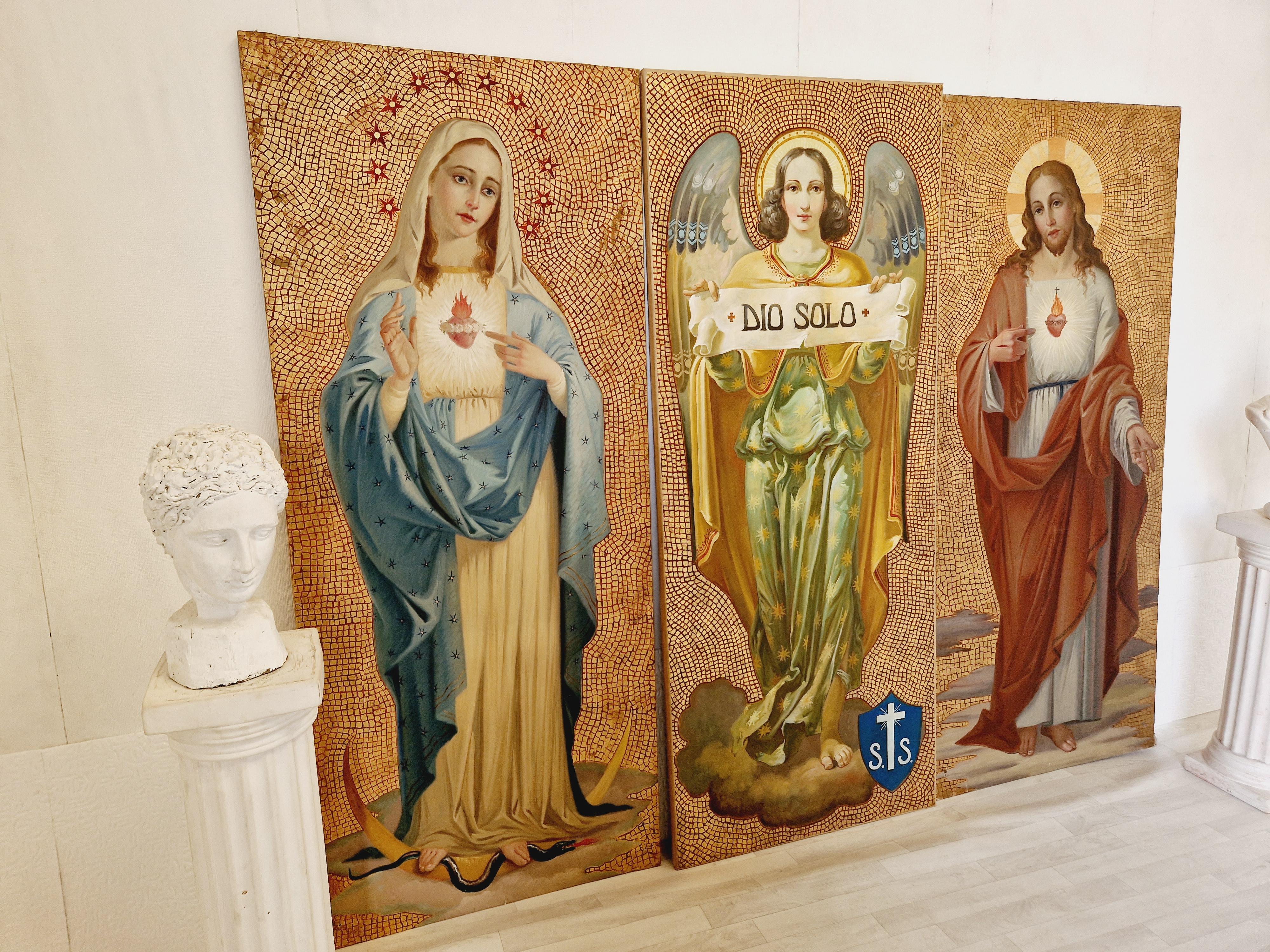 This exquisite triptych features three stunning paintings with a religious theme. The golden background adds a touch of elegance to this piece, which is sure to be a showstopper in any home. Created in the 19th century, the large paintings are made