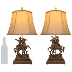 Un verdadero par de lámparas francesas del siglo XIX de bronce patinado de imitación de pórfido ormolu