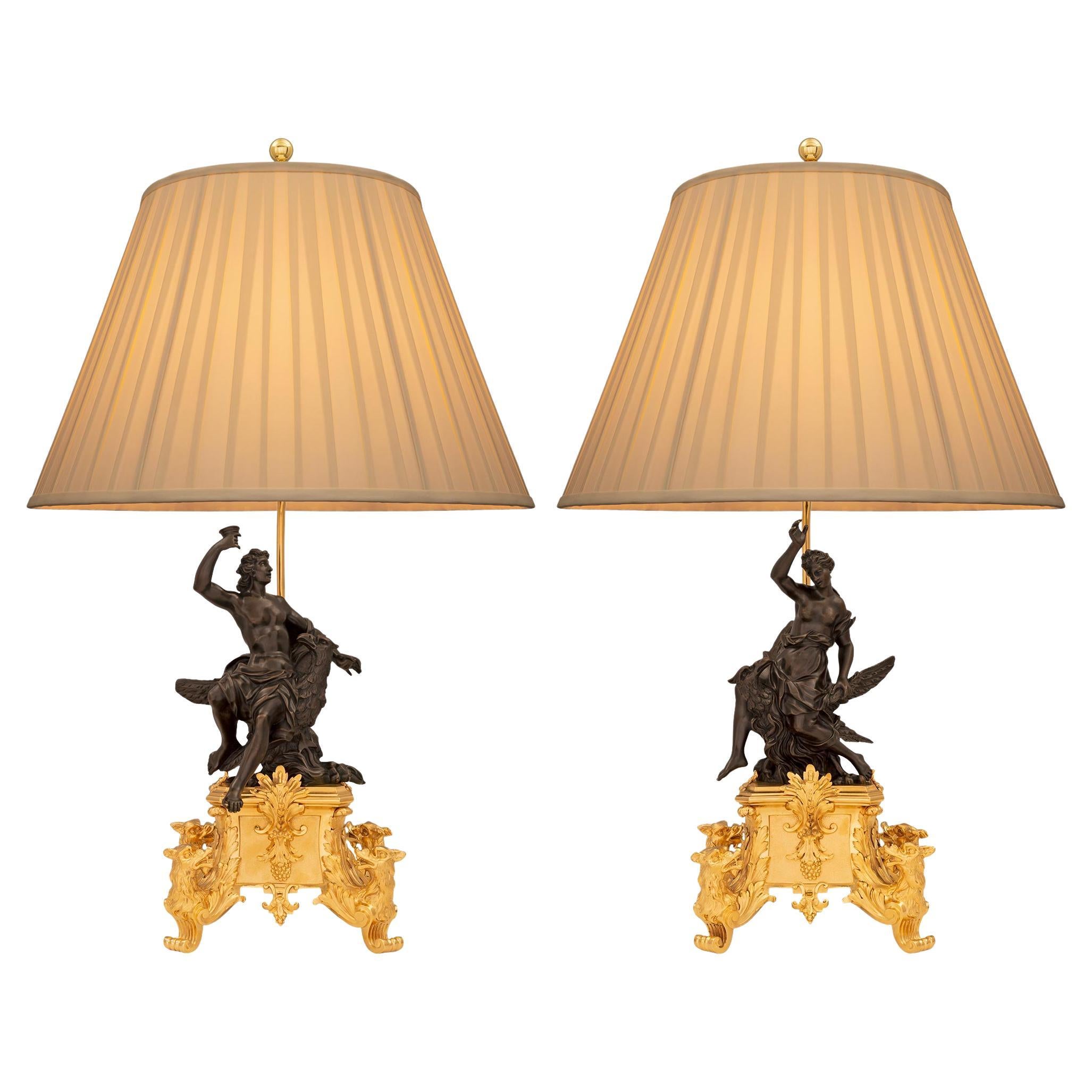 True Pair of French 19th Century Louis XIV St. Ormolu and Bronze Lamps For Sale