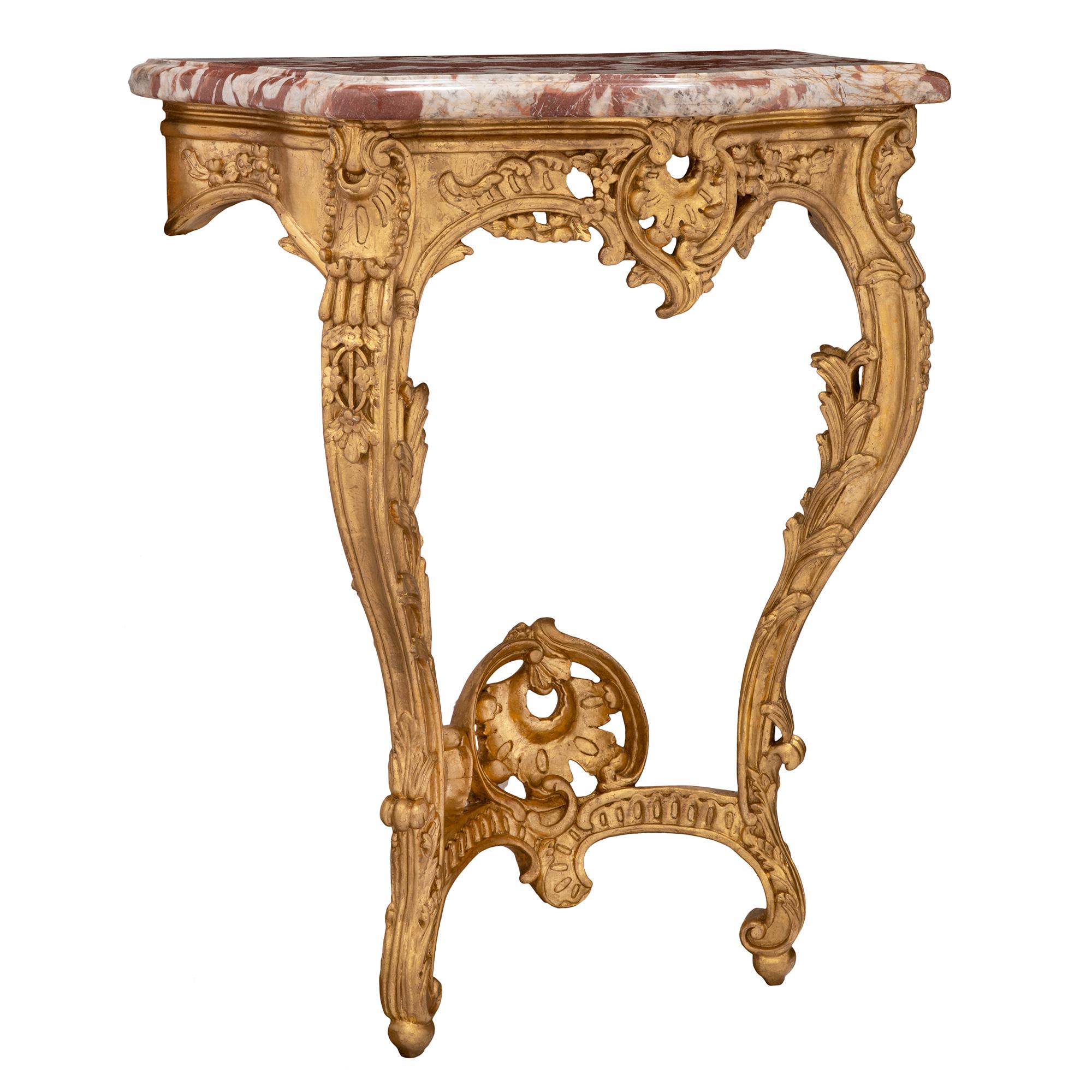 True Pair of French 19th Century Louis XV Style Giltwood Consoles In Excellent Condition In West Palm Beach, FL