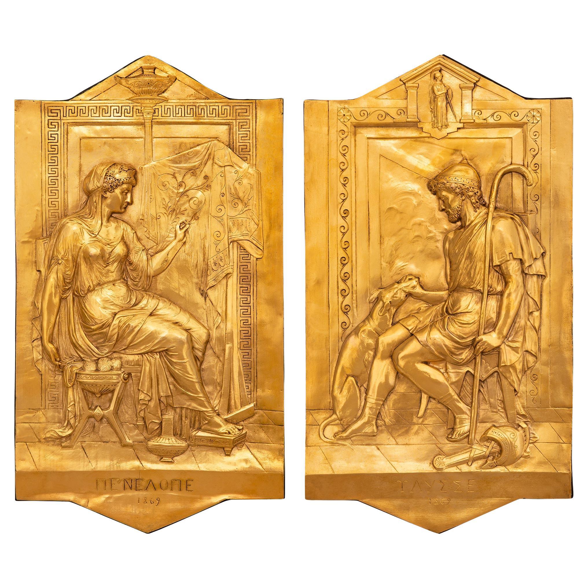 A true pair of French 19th century Neo-Classical st. Ormolu plaques, dated 1869