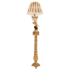True Pair of Italian Early 19th Century Louis XVI Style Giltwood Floor Lamps