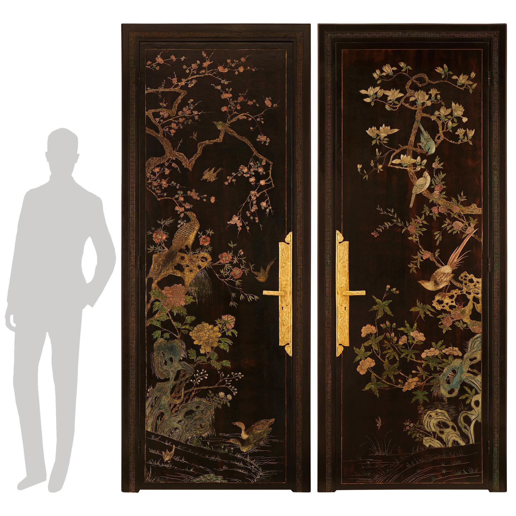 A true pair of Japanese 19th century Coromandel Laquered and Ormolu doors In Good Condition For Sale In West Palm Beach, FL