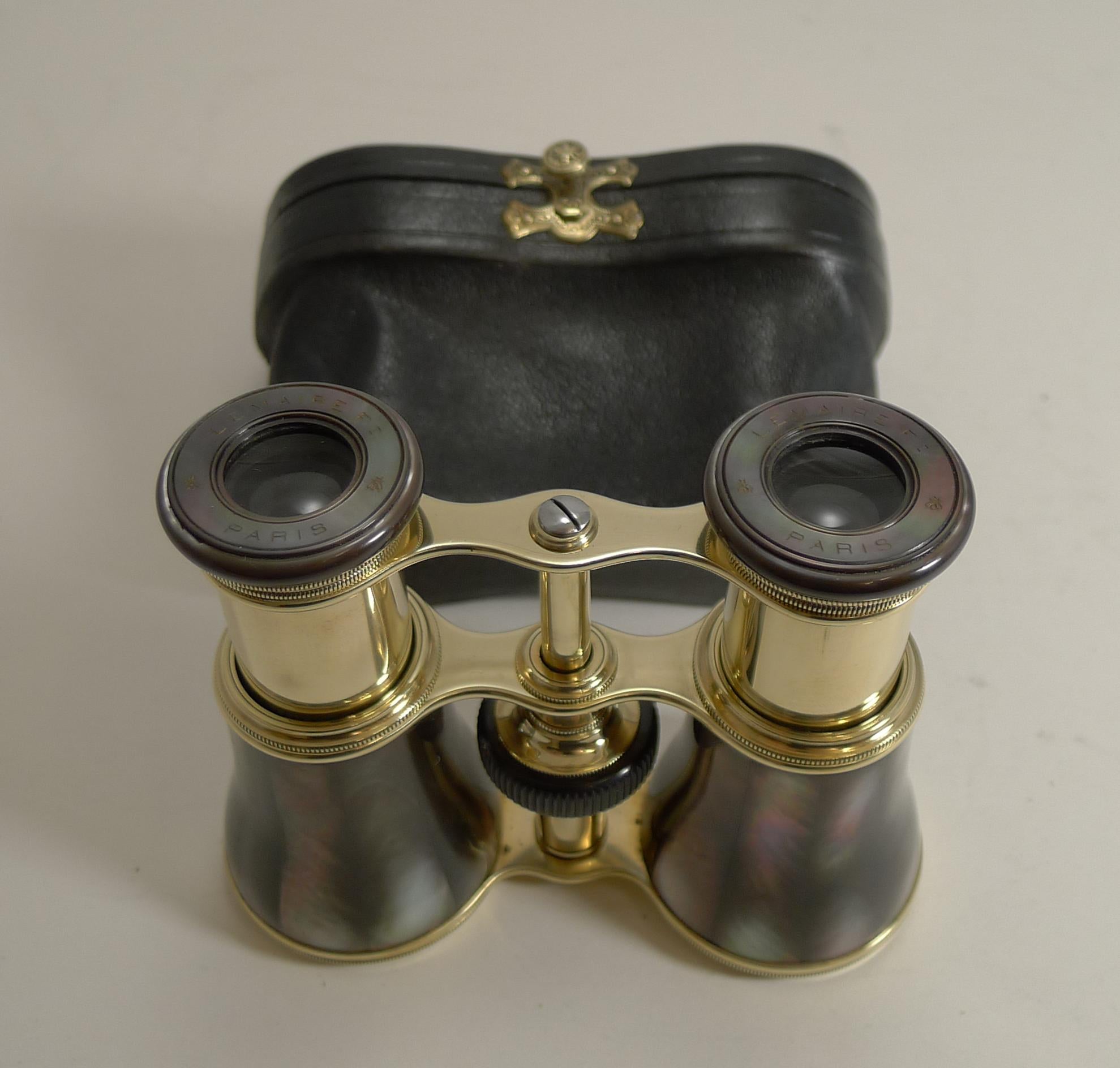 A truly exquisite pair of Opera Glasses by the top-notch maker, LeMaire of Paris, signed on both eye pieces with the two engraved tiny bee motifs, used by LeMaire.

The glasses are made from polished brass and Abalone shell with it's rich colour and
