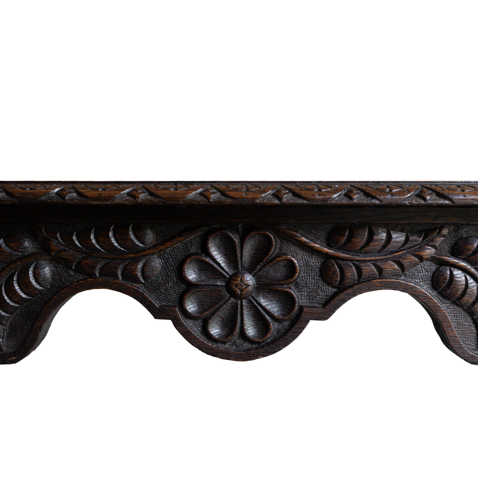 A Tudor-Style Carved Oak Center Table with Daisy Medallions, English, ca. 1880 In Good Condition For Sale In Banner Elk, NC