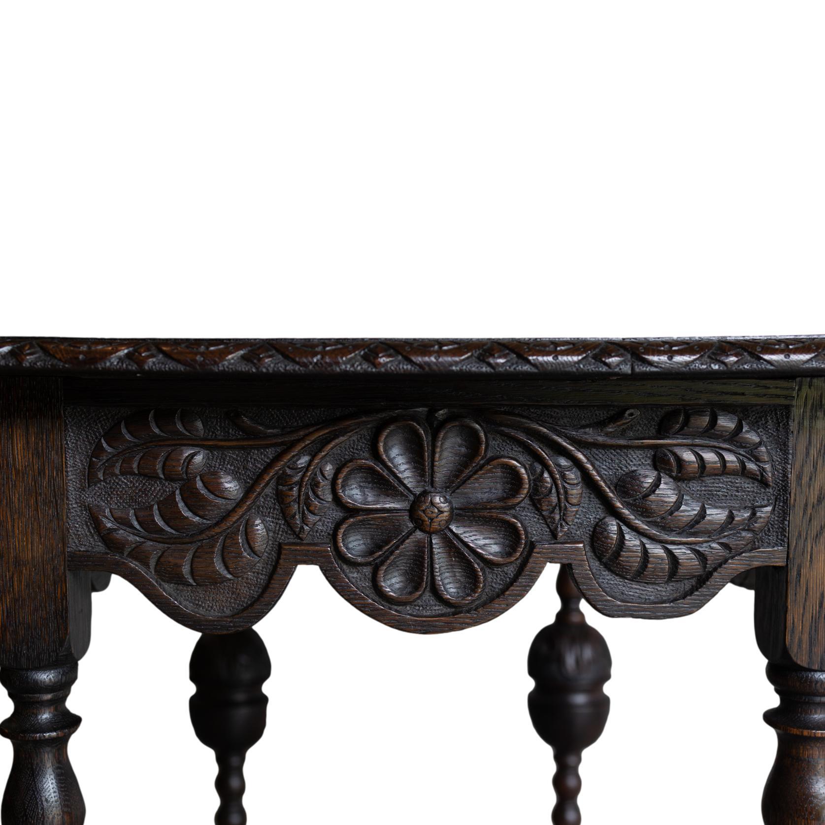 A Tudor-Style Carved Oak Center Table with Daisy Medallions, English, ca. 1880 For Sale 3