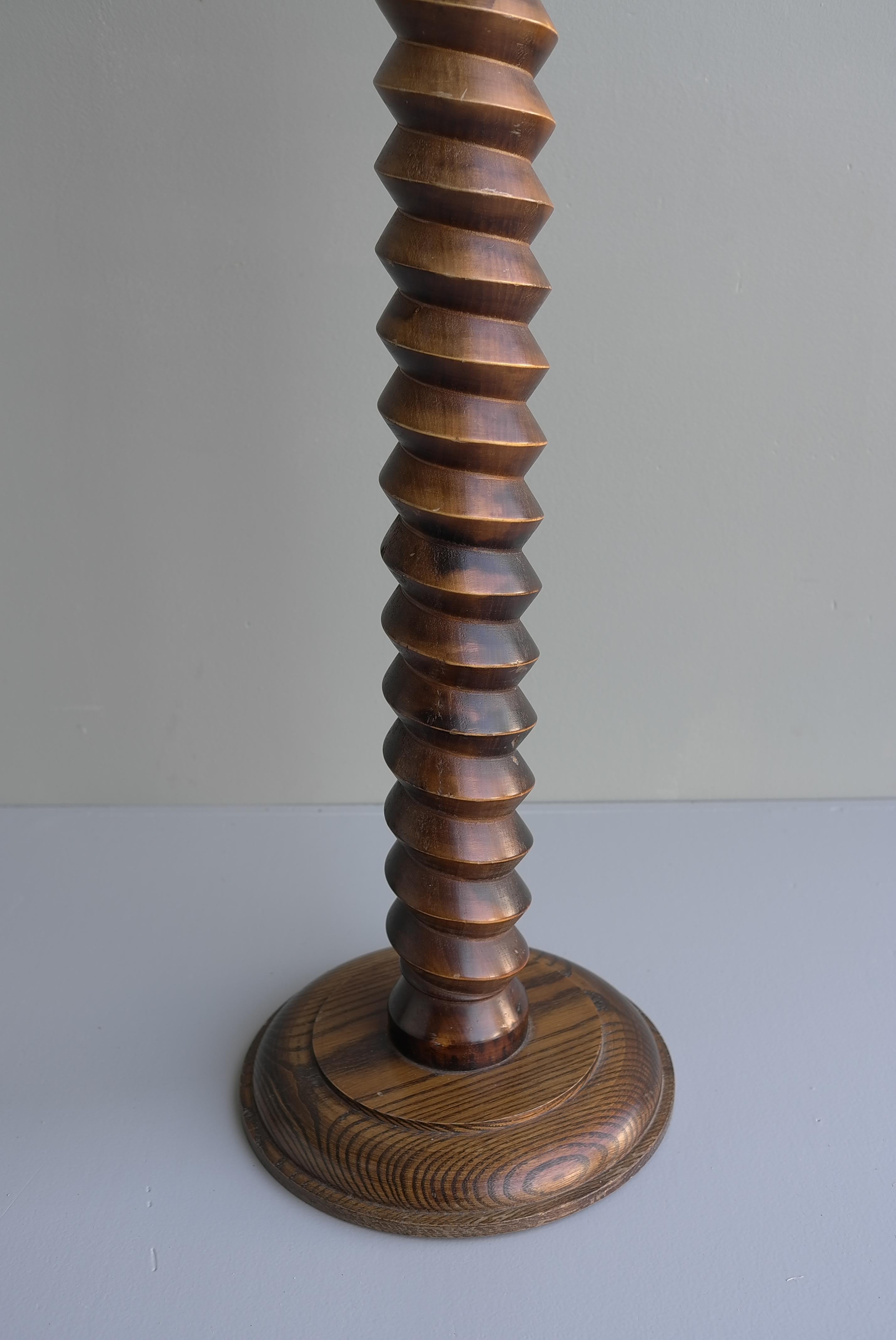 A turned solid Oak Pedestal in line of Charles Dudouyt. France, 1950s. Perfect for a Plant, Vase or other purpose.