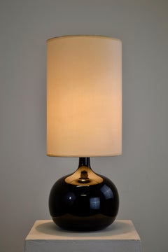 A turned wood table lamp, black lacquered - 1960 - France