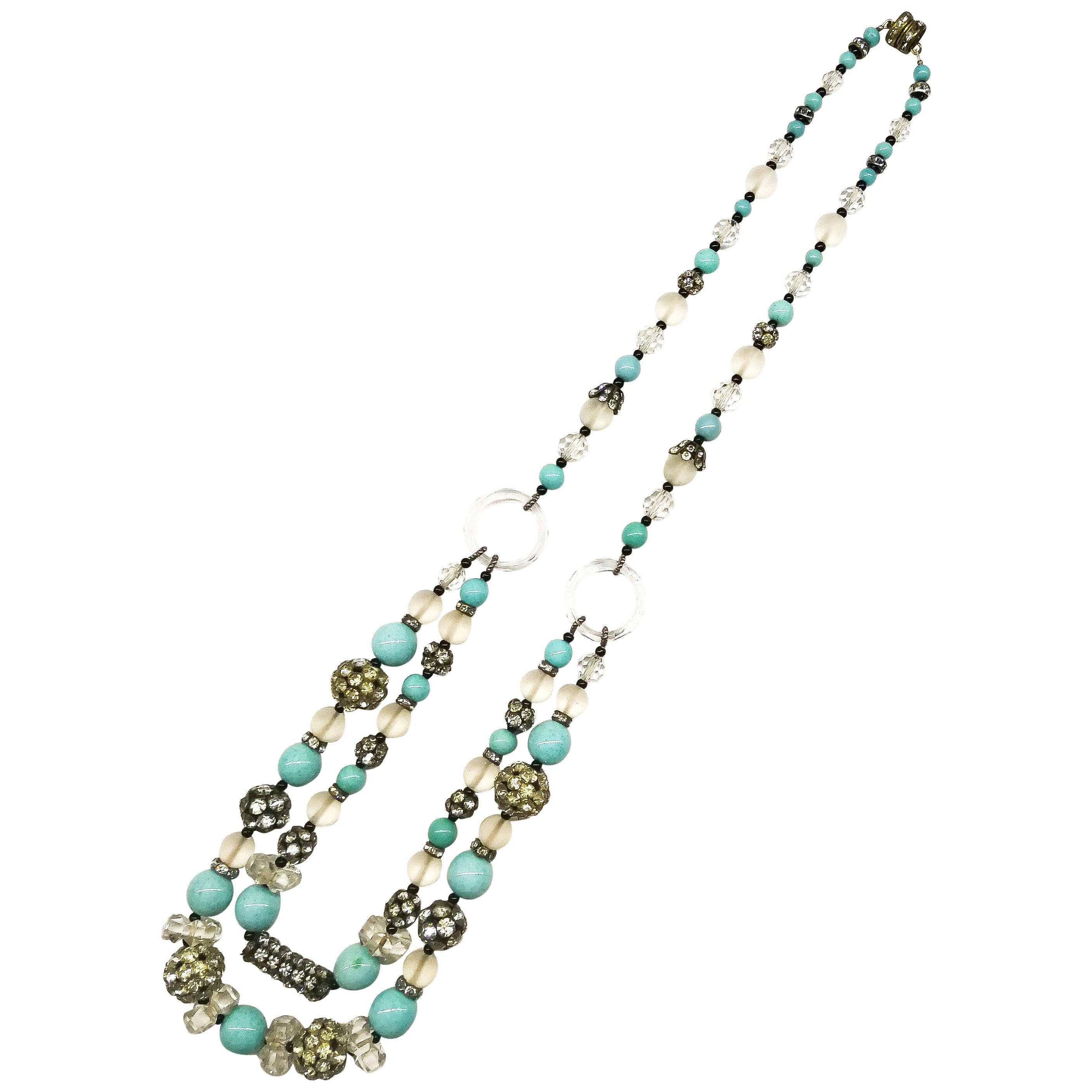 A turquoise and frosted bead, clear crystal and paste sautoir necklace, 1920s For Sale