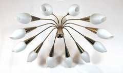 A Twelve-Light Ceiling Mounted Fixture in the Style of Carlo Mollino