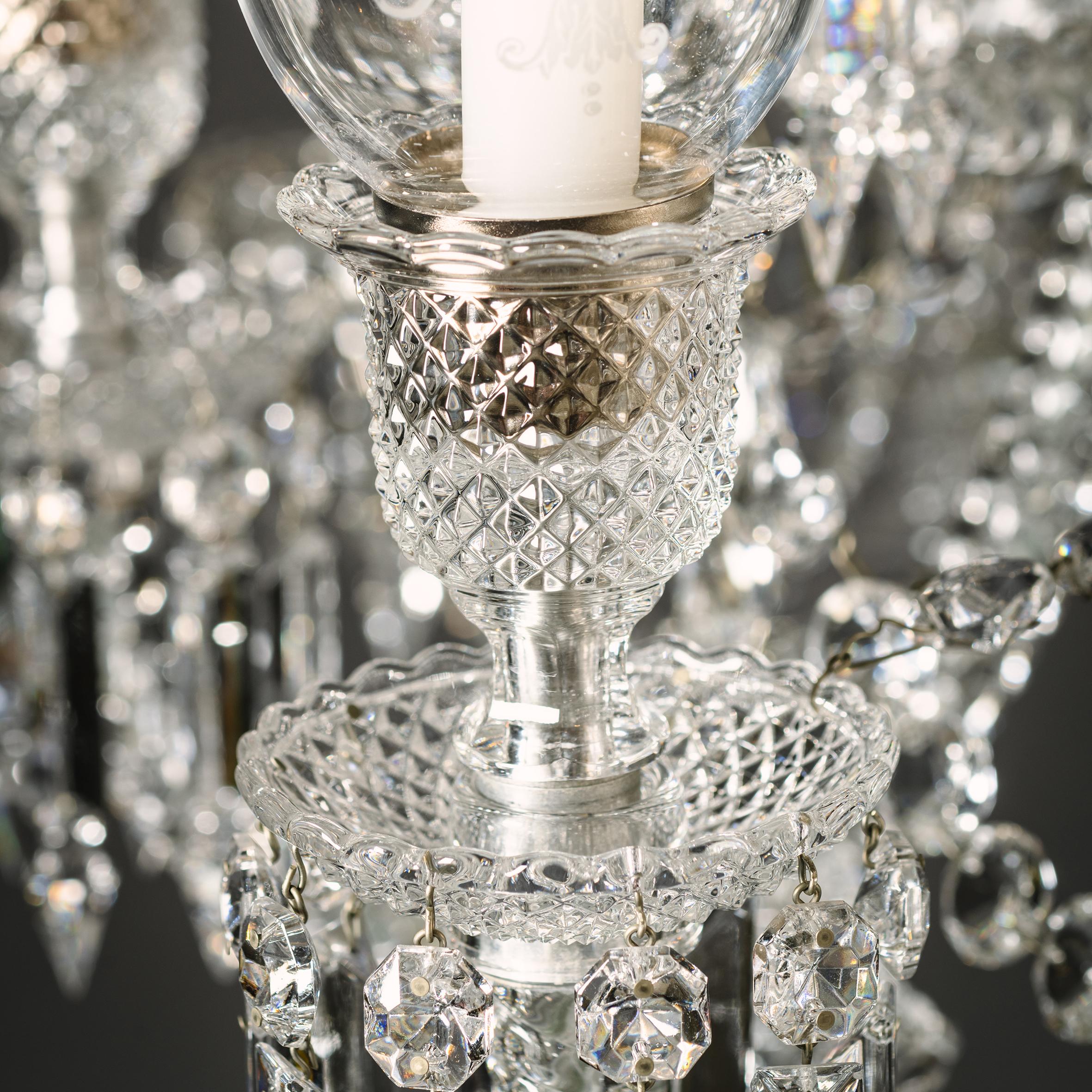 A Twenty-Four Light Crystal Glass Chandelier For Sale 11