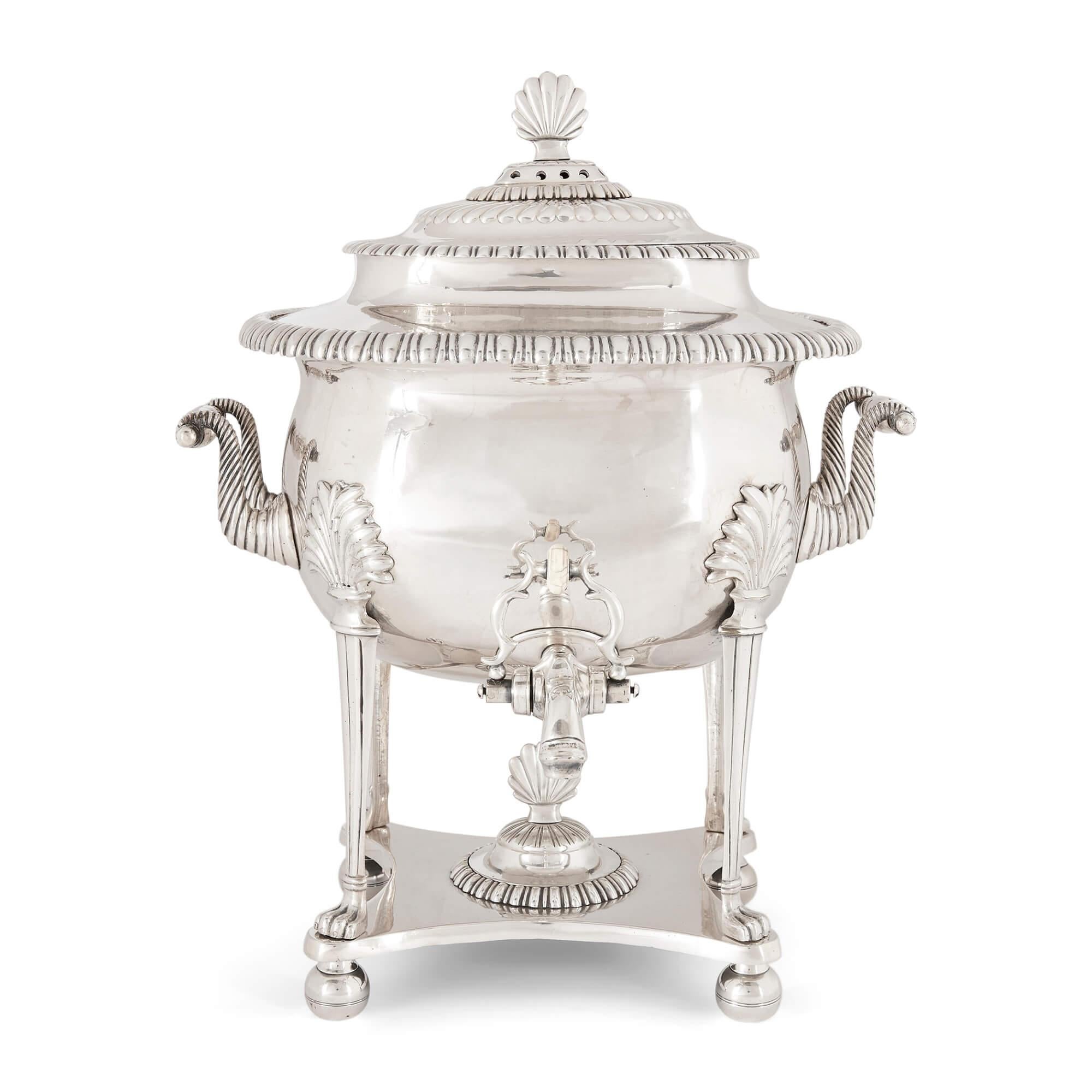 A twin-handled English silver plated samovar
English, Late 19th century
Measures: Height 43cm, width 33cm, depth 33cm

This magnificent piece is a large silver plated and bone handled samovar, a large vessel used in the preparation of tea, and