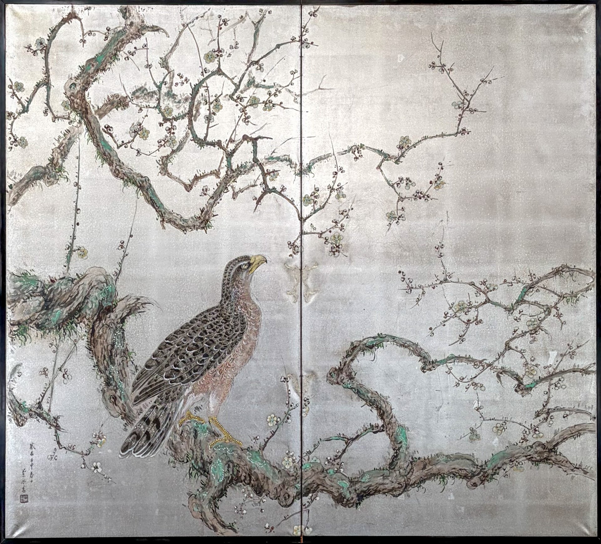 A two-panel silver-leaf screen depicting a hawk on a flowering plum branch